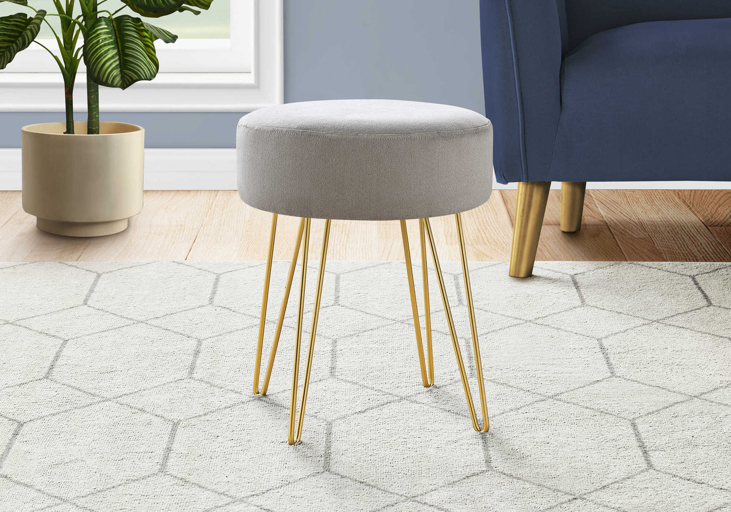 Silver Ottoman with Gold Legs
