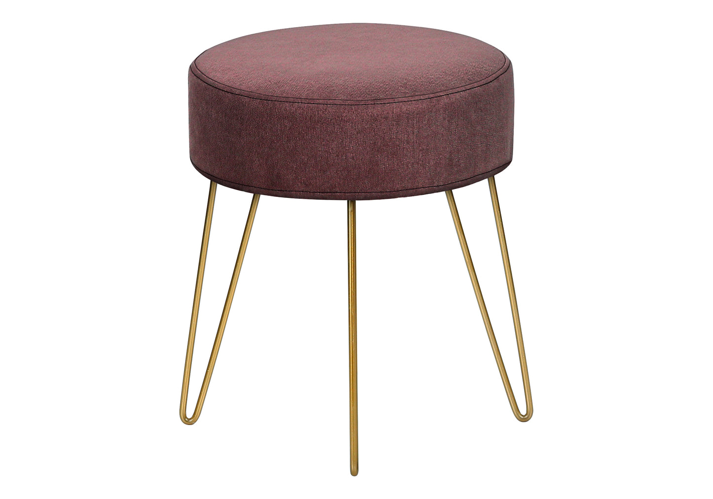 Close-up of plush blush pink upholstery and thin gold metal legs on round ottoman