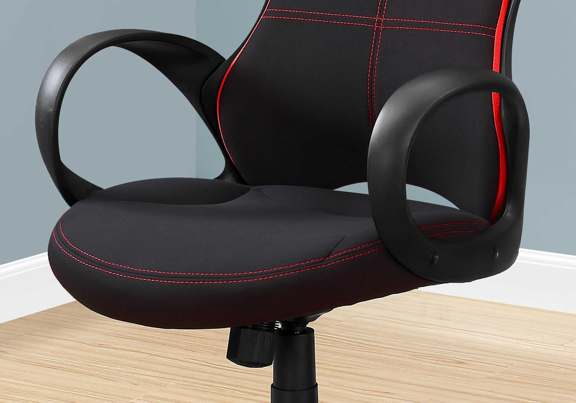 Side view of Red and Black Fabric Office Chair showcasing ergonomic padding and quality finish