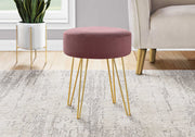 Blush pink fabric ottoman with sleek gold hairpin legs - versatile as footrest, seat, or side table