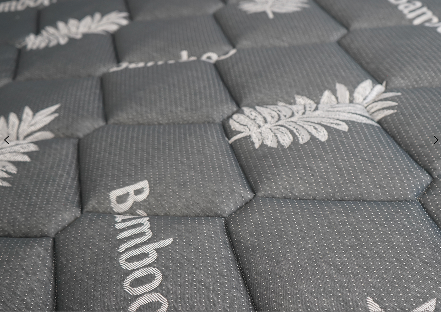 Close-up of soft pillow top layer showing breathable and plush surface