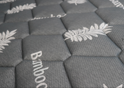 Close-up of soft pillow top layer showing breathable and plush surface